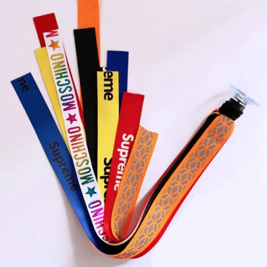 Close-up of a colourful decorative ribbon streamer attached to a child's helmet for roller skating or skiing.