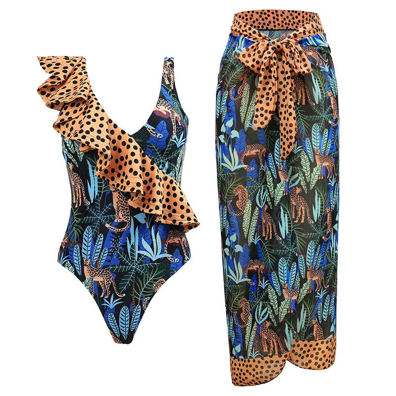 Women's solid colour one-piece swimsuit with spaghetti straps and a matching skirt.