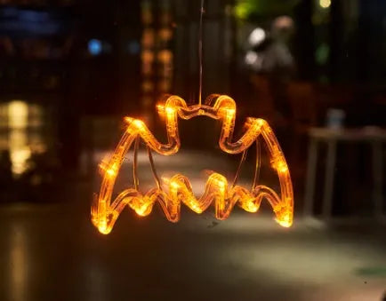 Halloween LED window hanging lights showing 7 horror characters including spider, pumpkin and ghost designs
