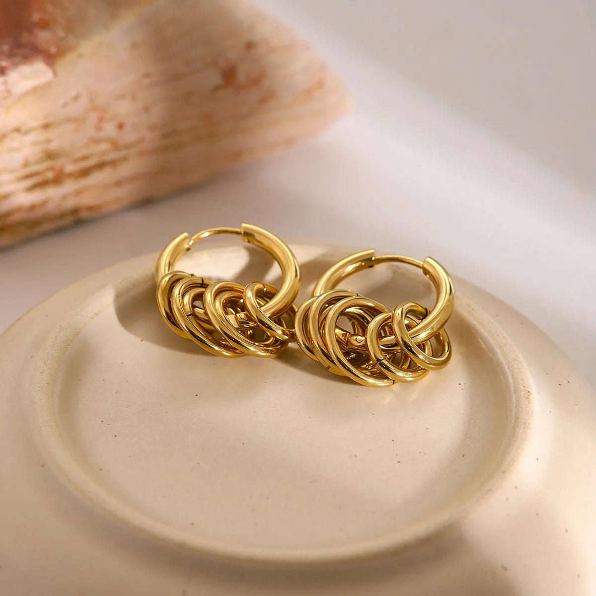 Stainless steel ins style earrings with electroplated finish in JDE2405019 colour.