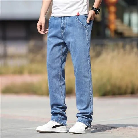 Men's straight leg jeans in smoky grey colour with a low waist and zipper fly