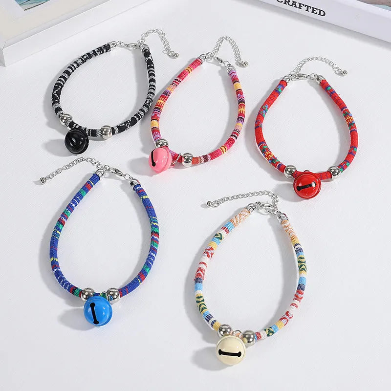 Ethnic pattern pet collar with bell attachment in multiple colour options including black blue pink red white