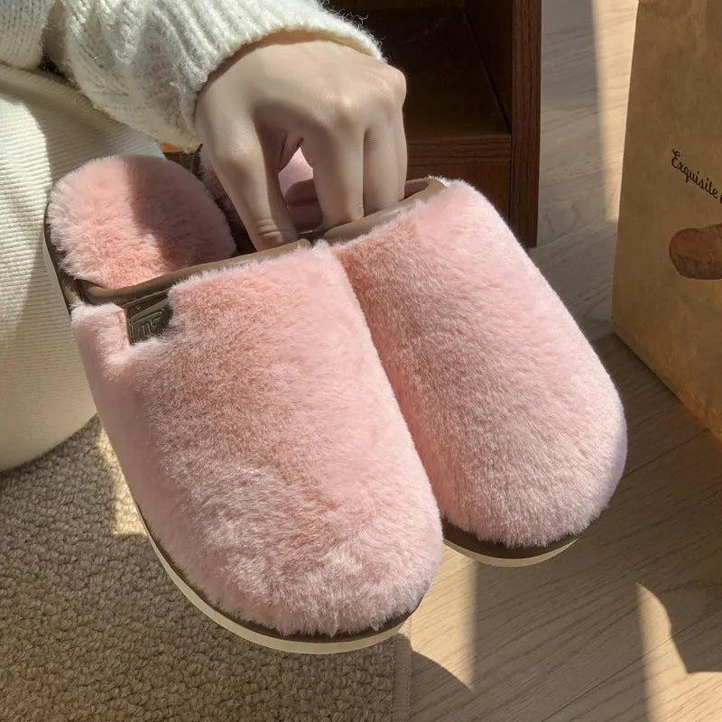 PVC plush winter slippers in solid colours with non-slip soles for indoor wear