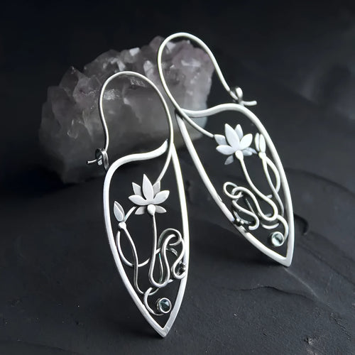 Silver electroplated lotus vine earrings with floral design and geometric round elements