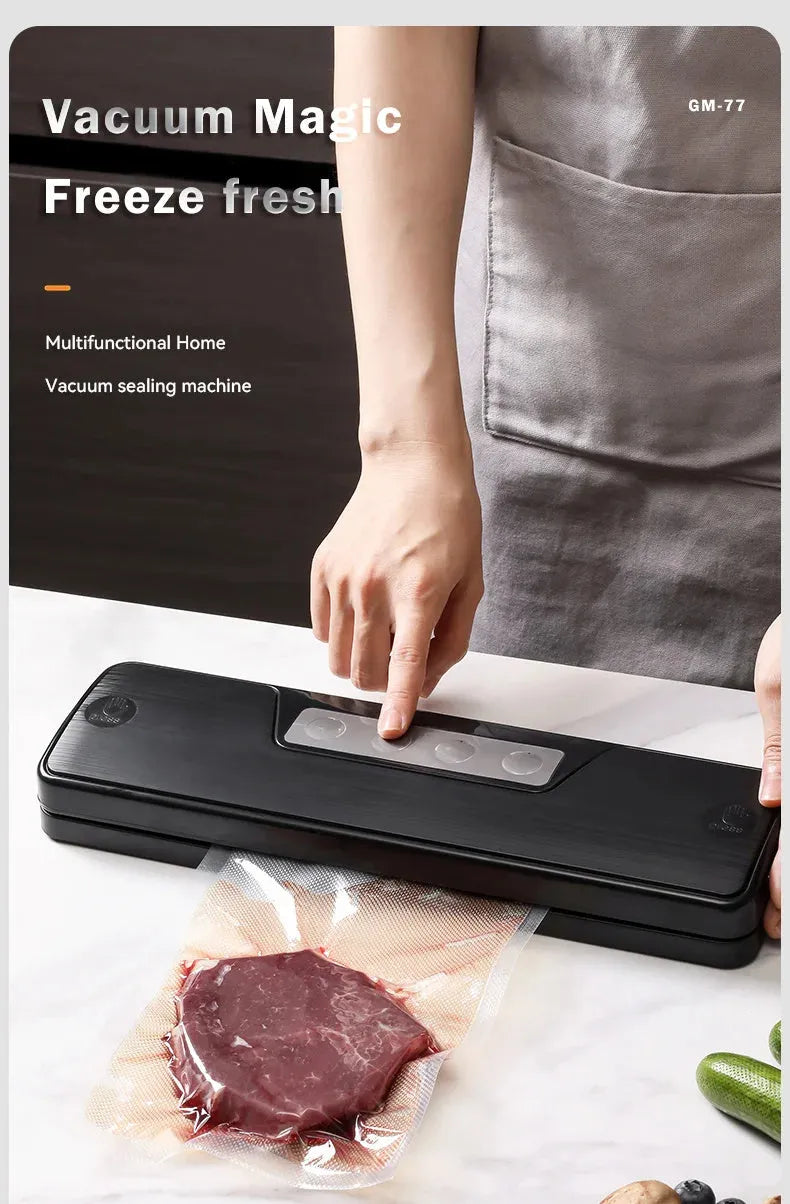 Black compact automatic vacuum sealing machine for home food preservation on a kitchen counter.