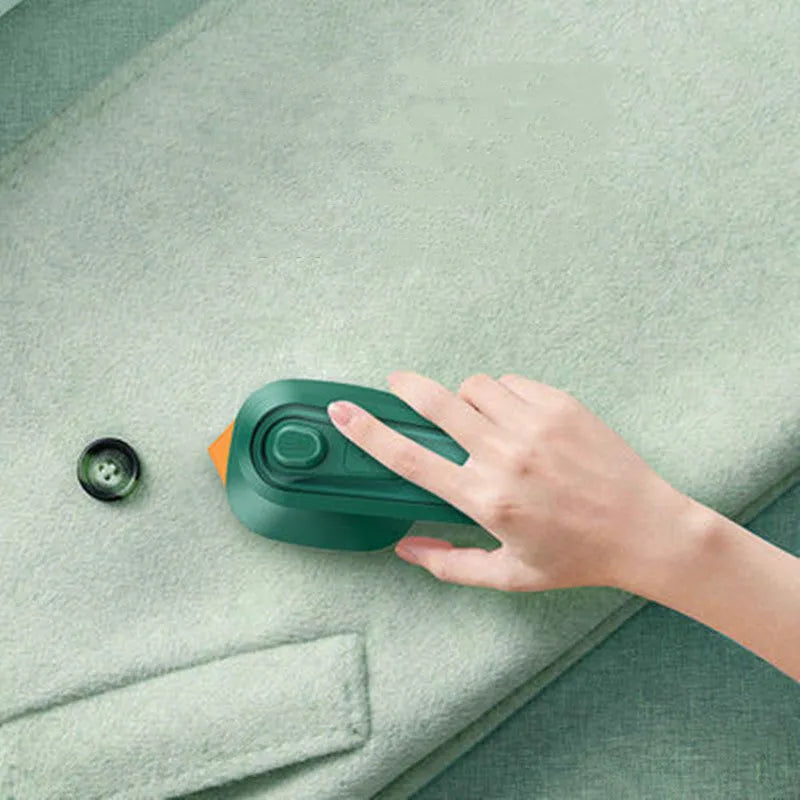 Dark green portable hanging ironing machine with ceramic panel and sharp corner design for travel use