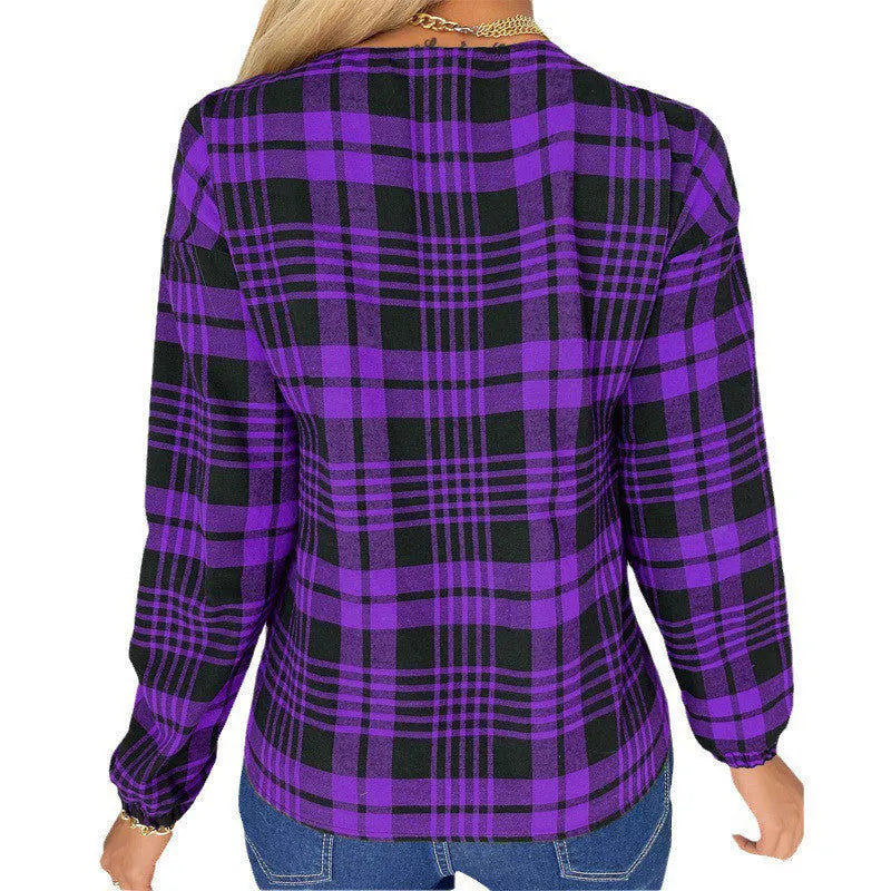 Women's loose-fit purple plaid casual shirt with regular sleeves on a hanger