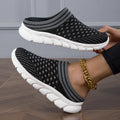 Women's black Flyknit semi slippers with hollowed-out sewing line detail and viscose sole