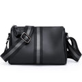 Black genuine leather one-shoulder crossbody bag showing front and side view.