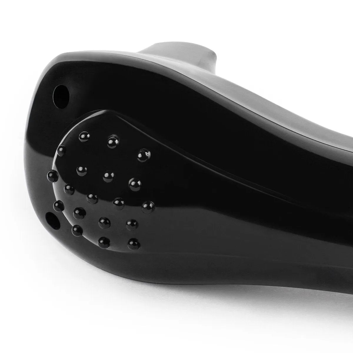 Black folding electric body hair shaver on a white background.