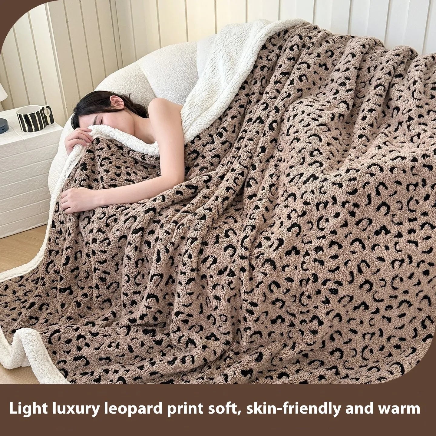 Double-layer leopard jacquard taffeta blanket in camel zebra pattern on a single bed.