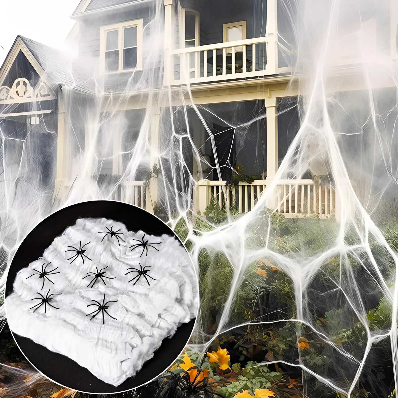 White cotton spider web Halloween decoration with plastic spiders for party or haunted house atmosphere