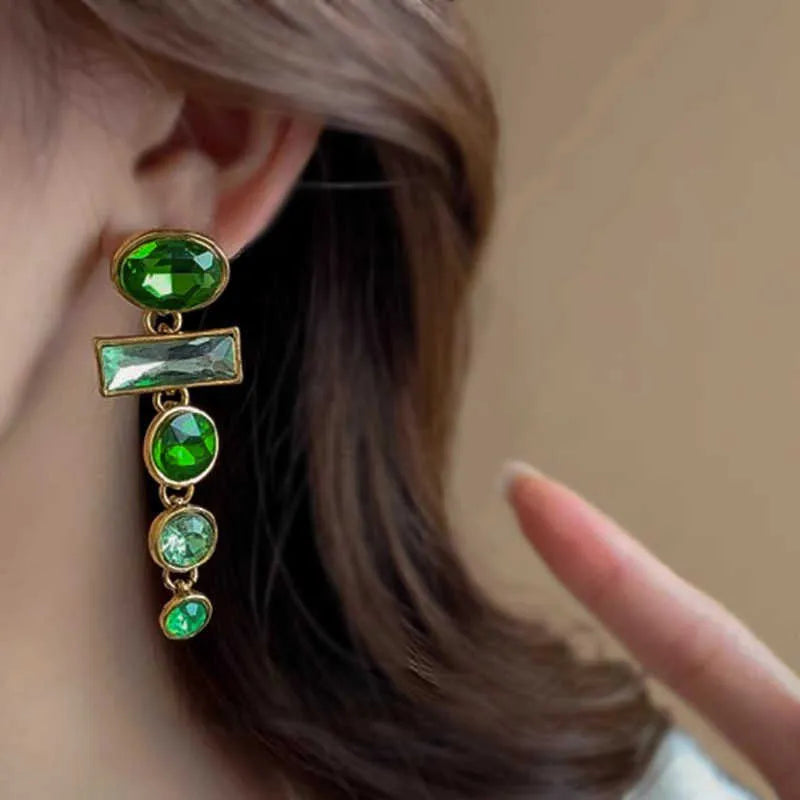 Green gradient geometric Chinese style tassel earrings with inlaid zircon detailing on alloy studs