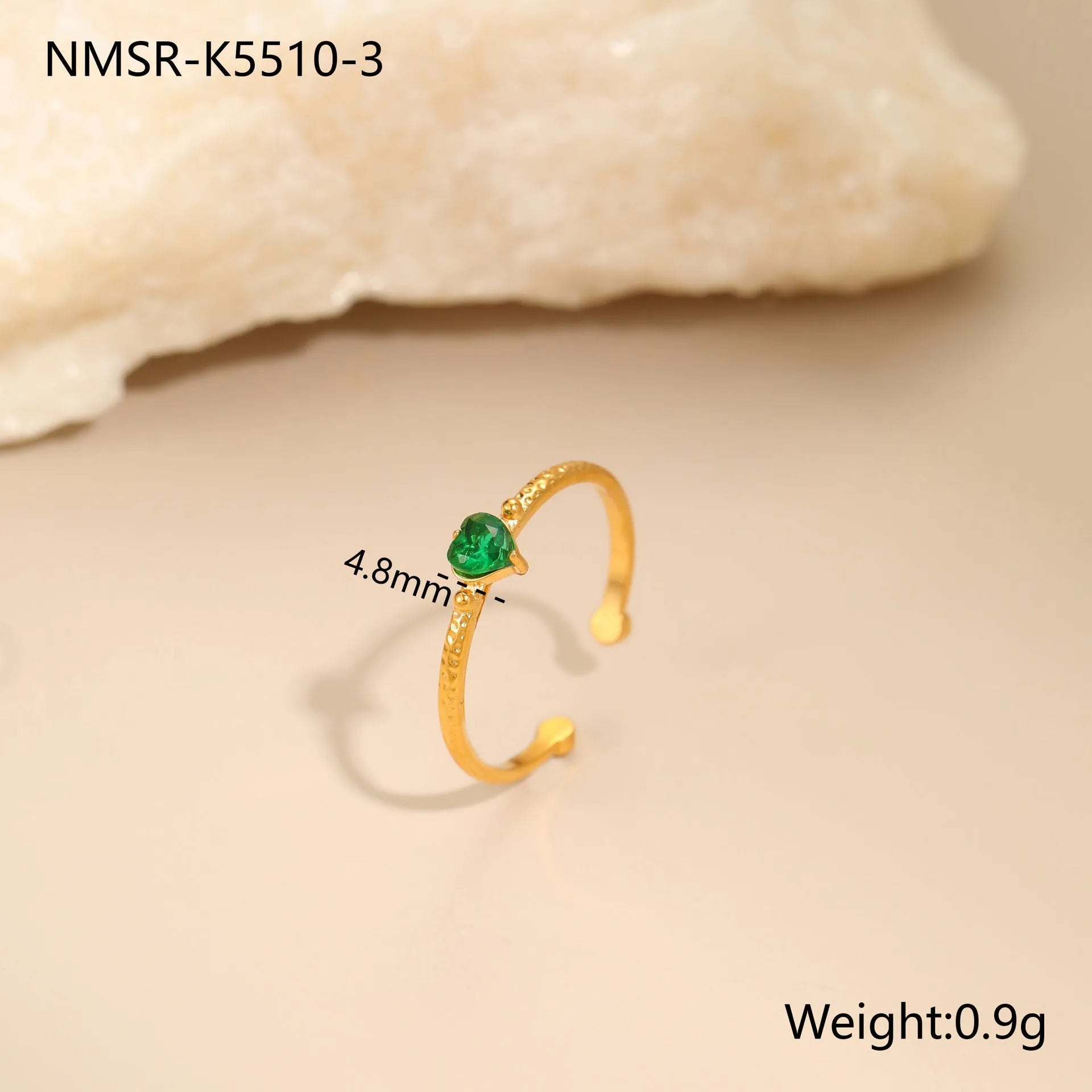 Open ended stainless steel ring with a geometric heart shape and inlaid zircon stone in white, pink, or green.