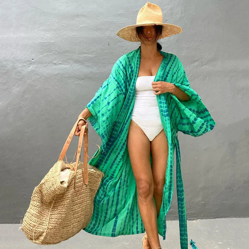 Women's printed cotton beach cover-up shirt in loose fit for sun protection over bikini.
