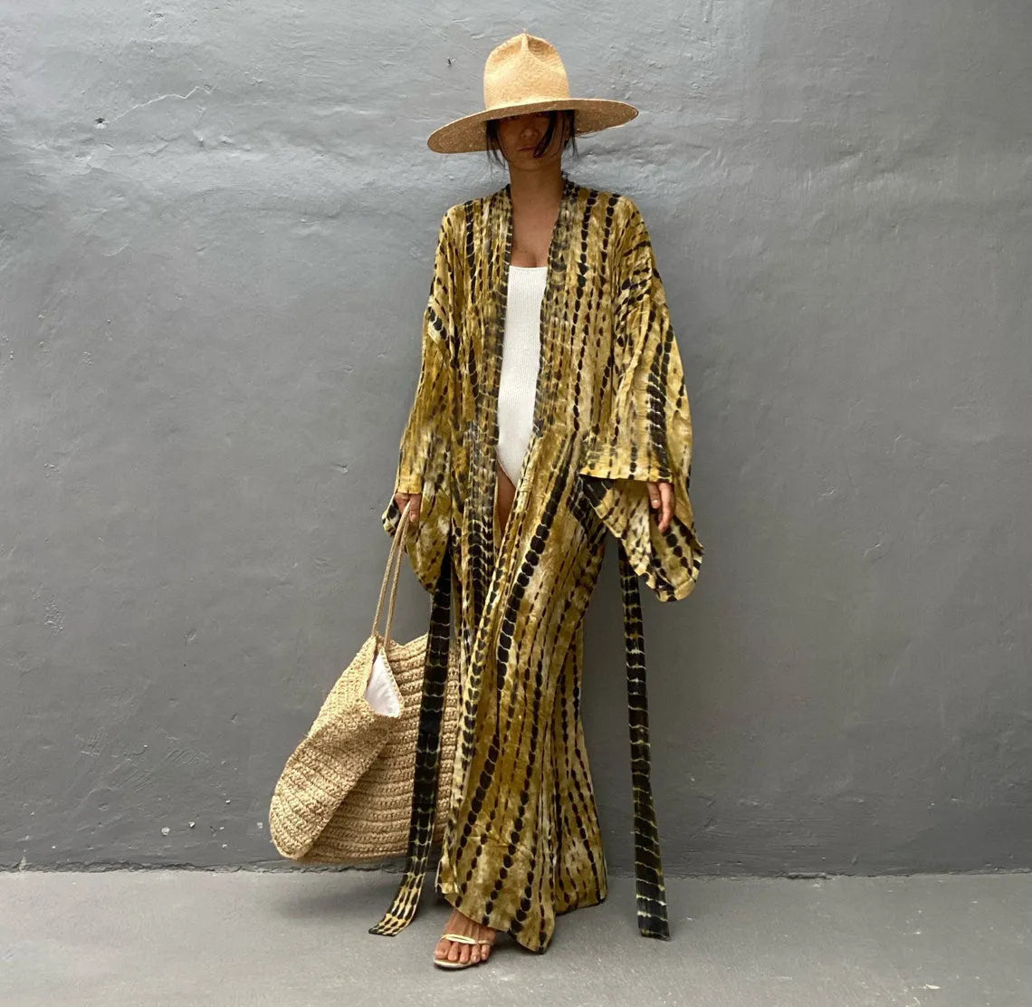 Women's printed cotton beach cover-up shirt in loose fit for sun protection over bikini.