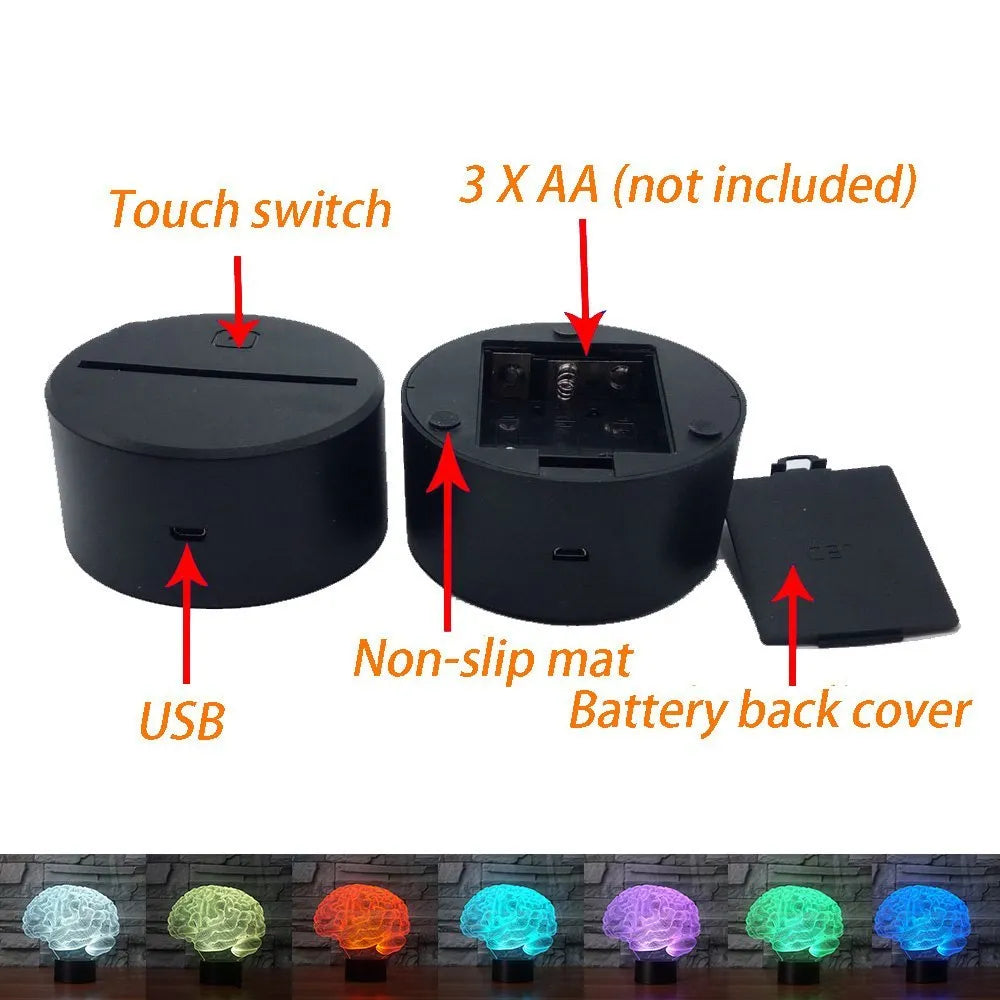 3D acrylic brain illusion LED desk lamp with remote control on a wooden table.