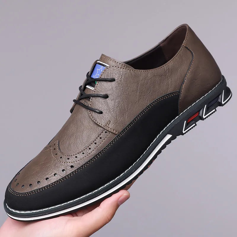 Men's black casual leather slip-on shoes with a rubber sole and visible sewing line details on a leather toe cap.