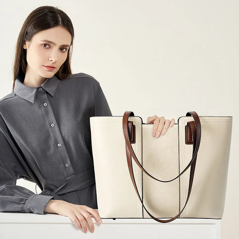 Women's genuine leather crossbody commuter bag in horizontal square shape with multiple internal compartments