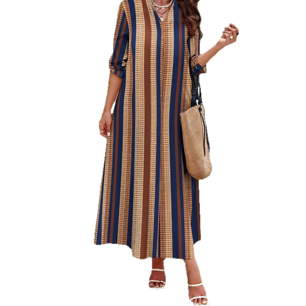 Women's camel coloured vertical striped V-neck dress with long sleeves and A-line skirt