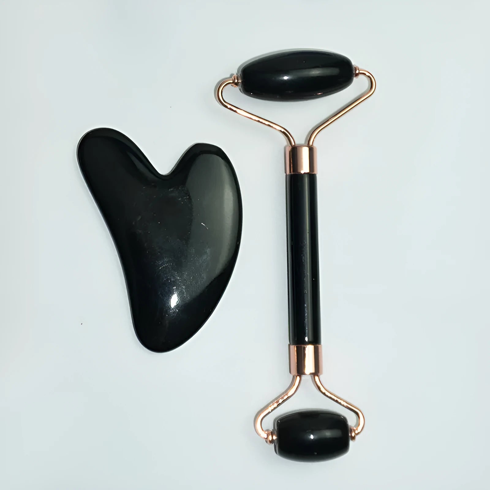 Stainless steel facial massage board with double head roller and heart-shaped eye poking stick for acupressure therapy