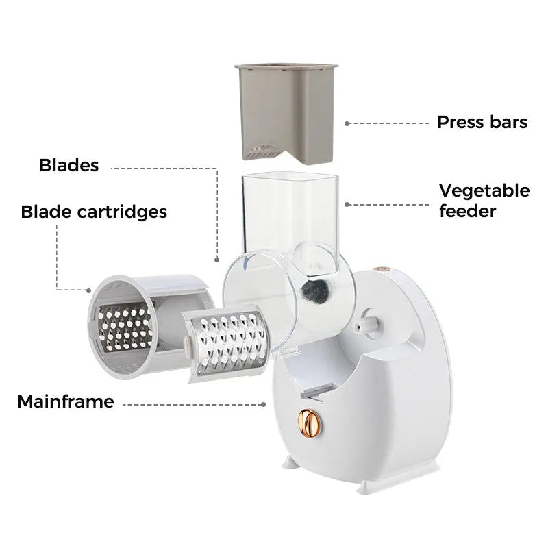 White electric vegetable slicer with rotary grater, three blades, and suction base on kitchen counter