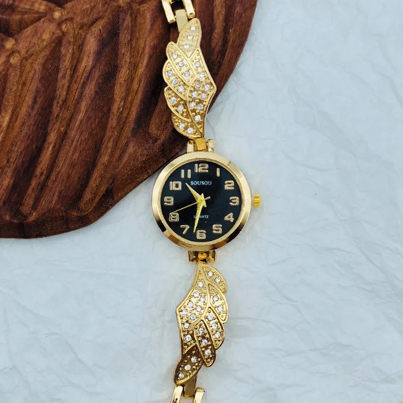 Women's stainless steel watch with round dial showing gold surface option and vachette clasp buckle