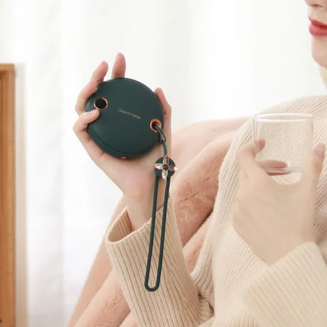 Square green hand warmer power bank with digital display showing battery percentage and Type-C charging port