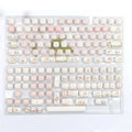 MOG profile PBT keycap set with steamed bread and bear design, 143 keys laid out.