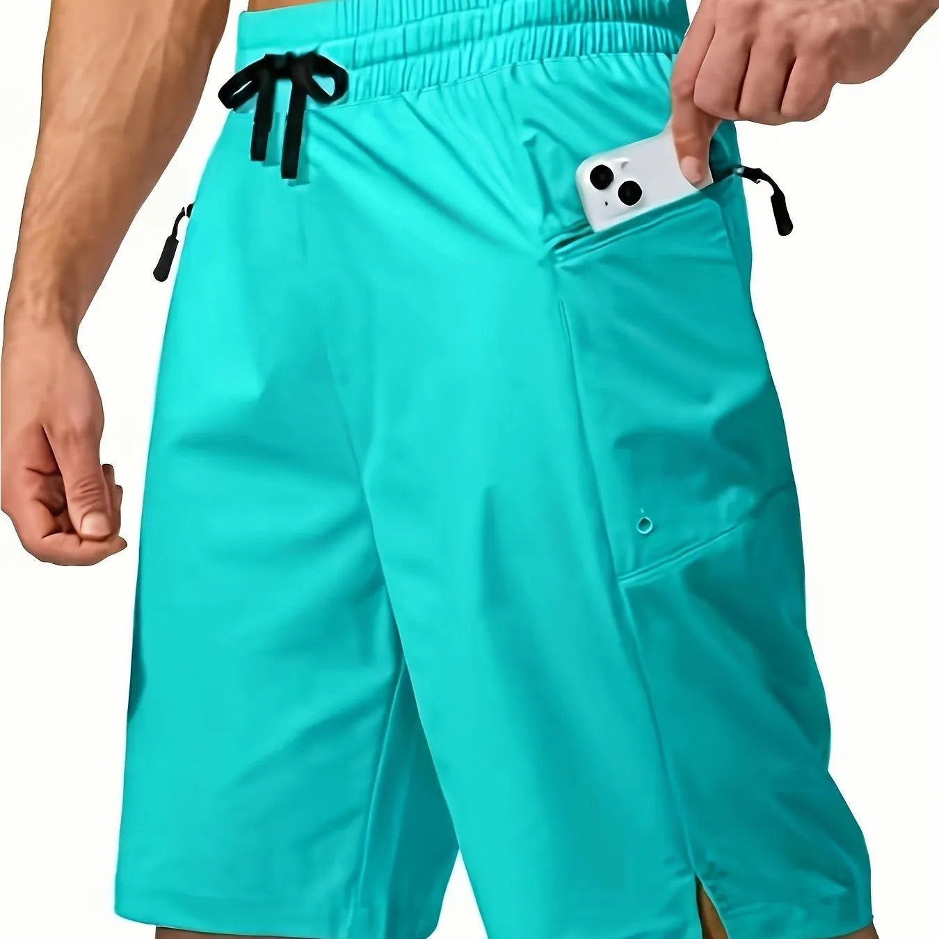Man wearing straight cut quick-dry polyester beach shorts in a solid colour.