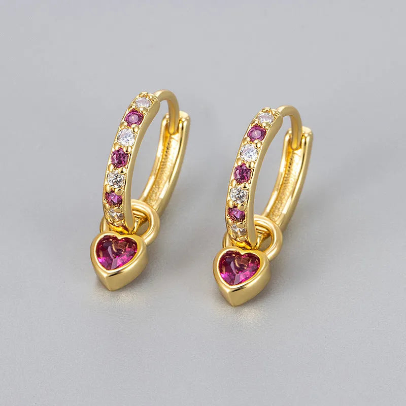 Women's copper earrings with heart-shaped drops and coloured stone accents in gold or white gold tone settings