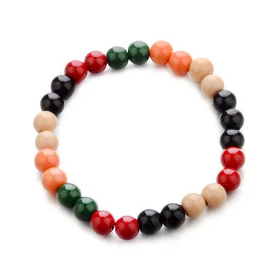 Natural lava stone beaded bracelet for essential oils, ethnic style, on a white background.