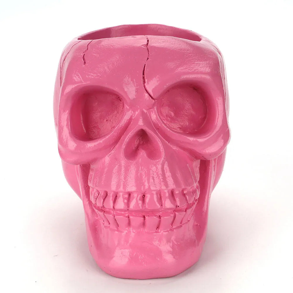 Skull head resin storage tube in black, 11x15x11cm, with open top showing inner 7cm diameter for storing beauty tools