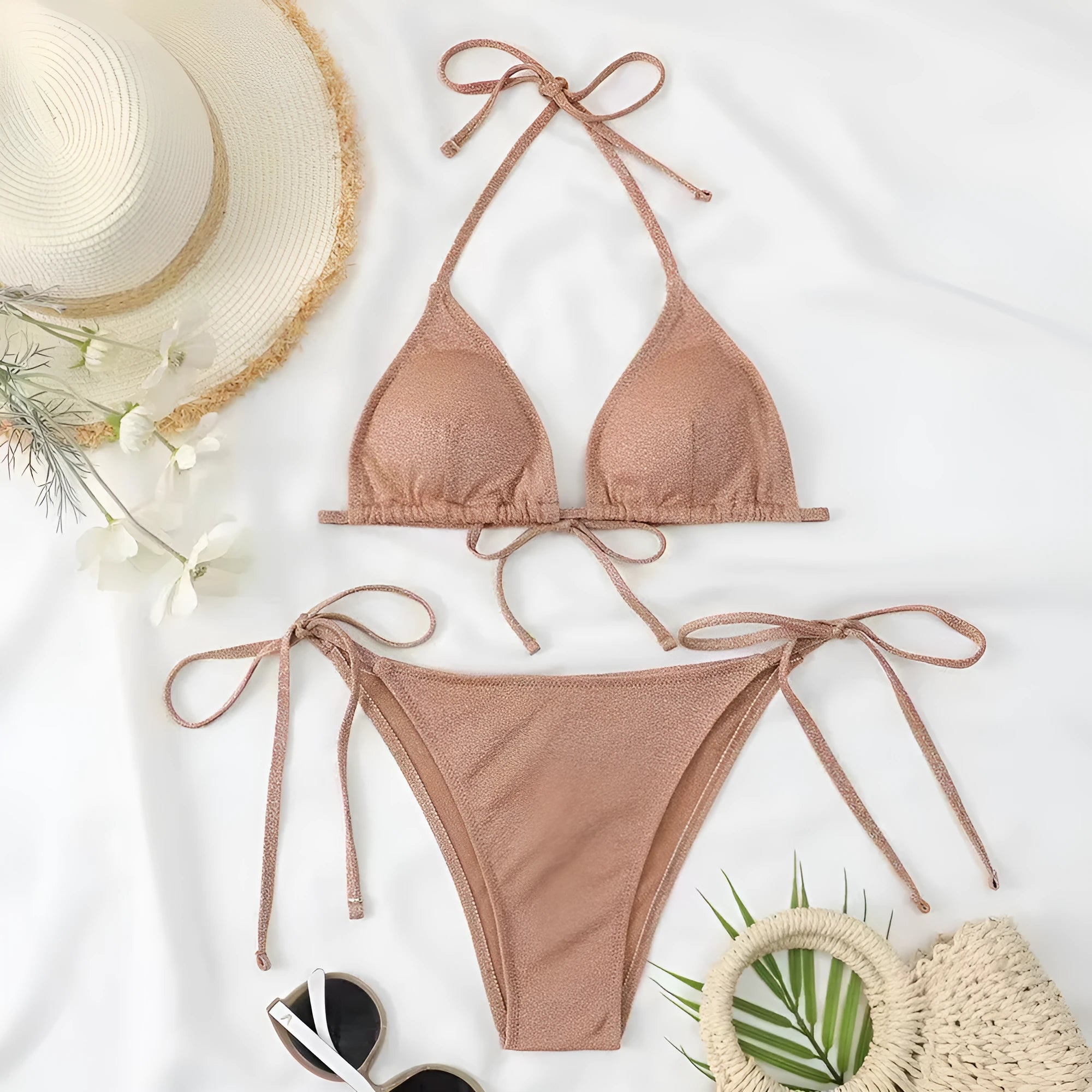 Women's bandage style bikini swimsuit in multiple colours on a size chart.