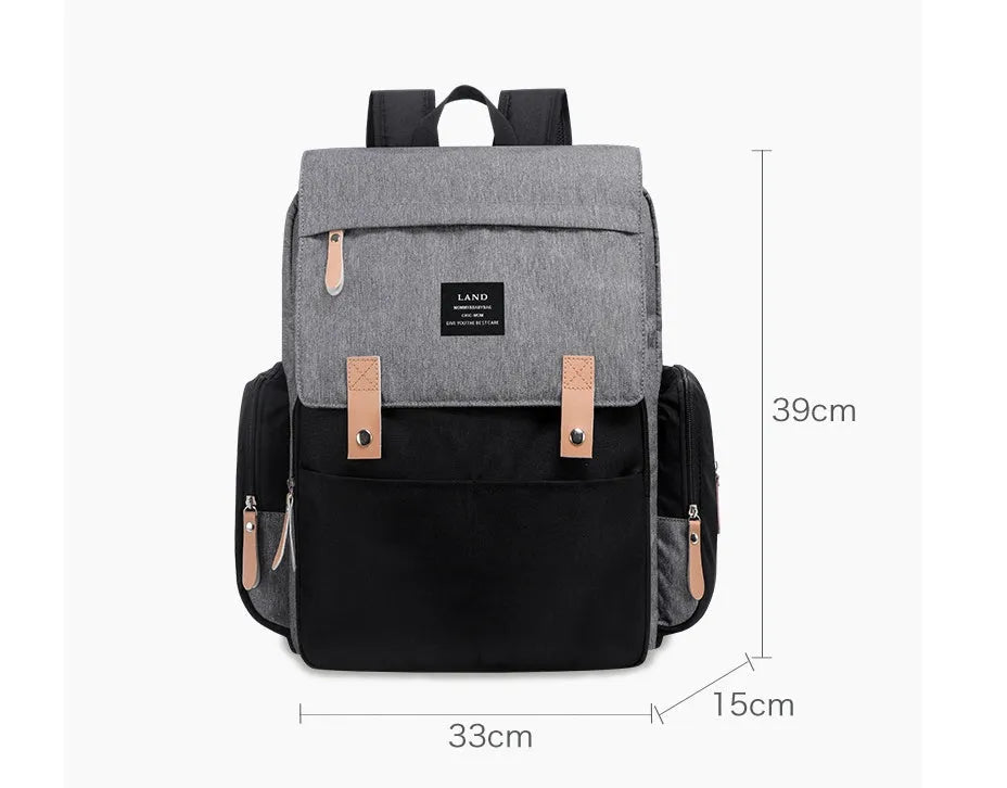 LAND Mommy large Oxford cloth diaper backpack with changing mat in various colours.