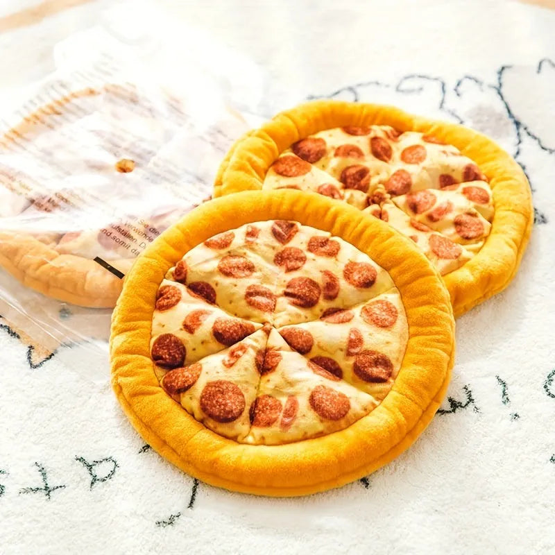 Yellow pizza slice shaped dog chew toy with textured pepperoni and crust details