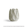 Irregular ceramic vase for flower arrangements in high style or low style profile