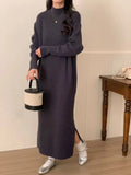 Beige acrylic knit dress with half-turtleneck collar and high waist.