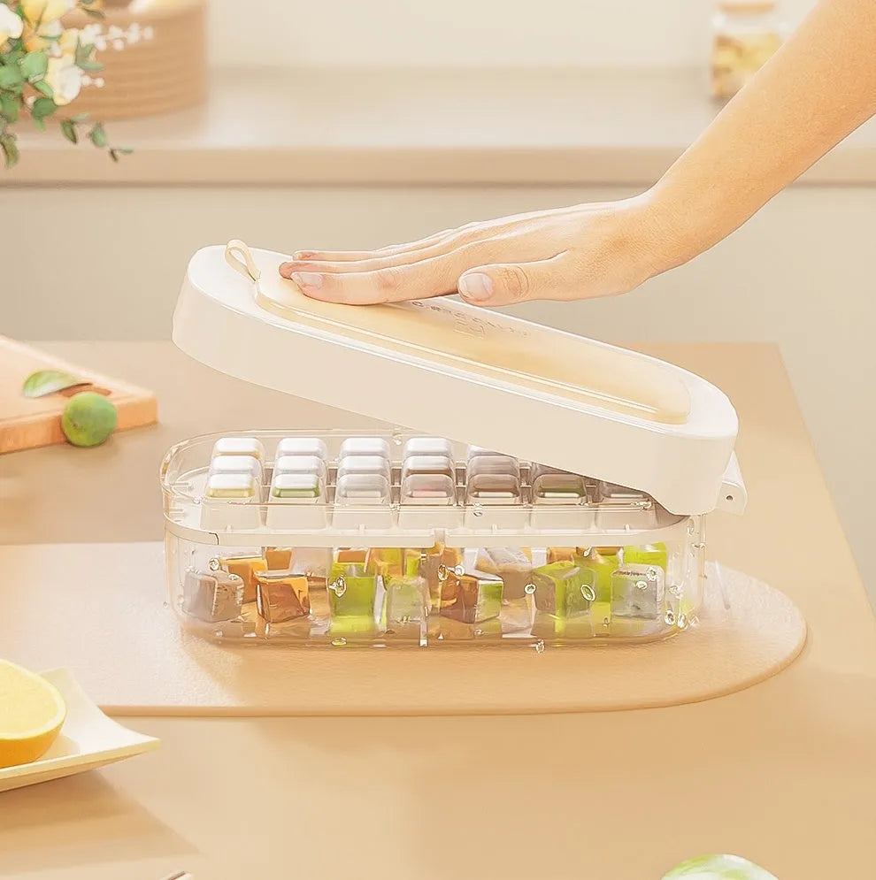 Colourful ice cube tray with grid design and integrated ice shovel storage compartment