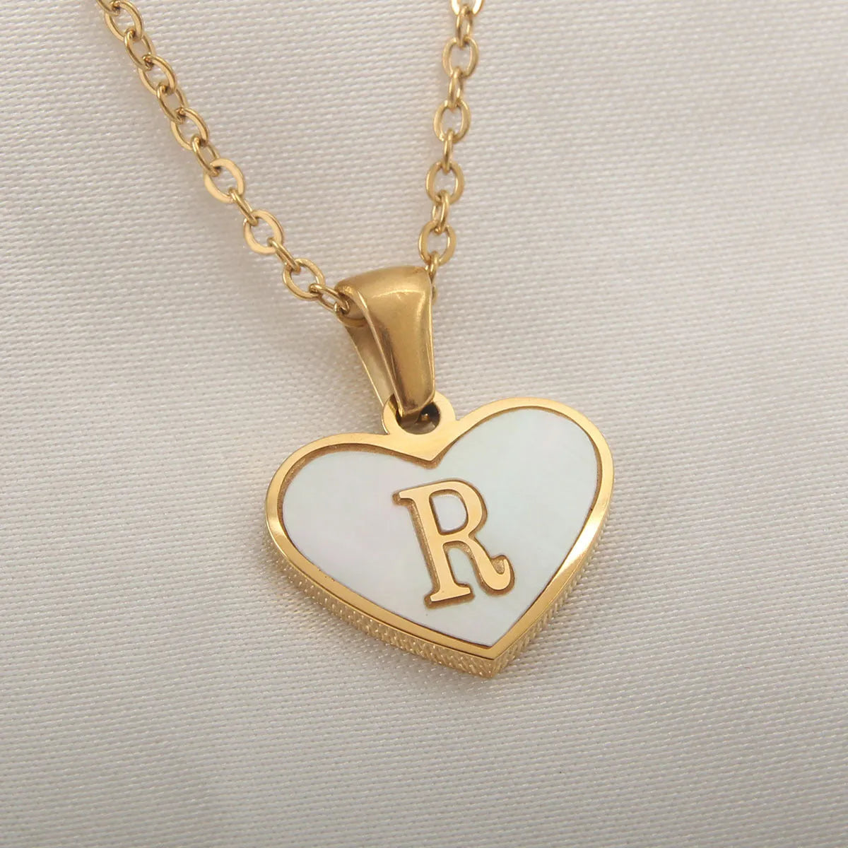 Gold plated personalised heart necklace with white shell on a 45cm chain