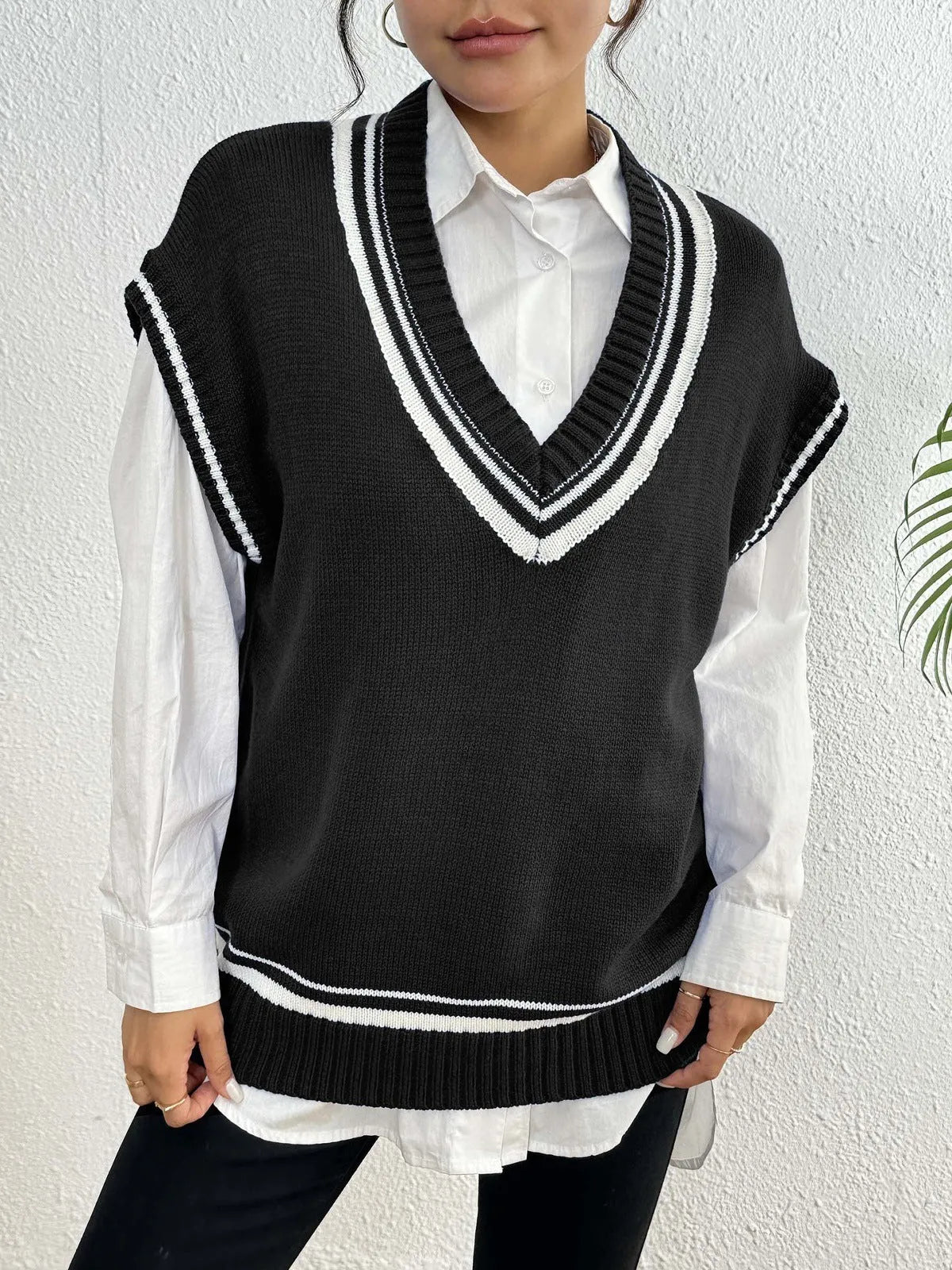 Women's college style casual vest sweater in loose fit with acrylic polyester blend fabric