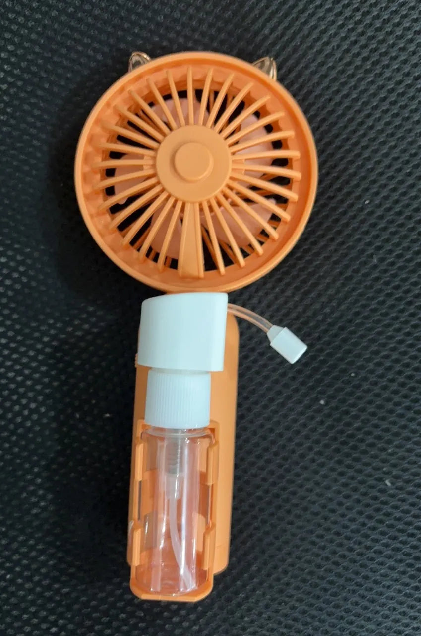 USB rechargeable plastic nozzle desk fan in apricot colour with compact 20cm width design