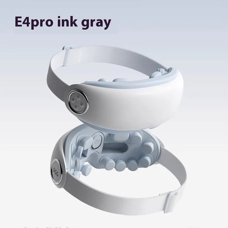 A purplish grey Bluetooth steam hot compress eye massage device on a white background.