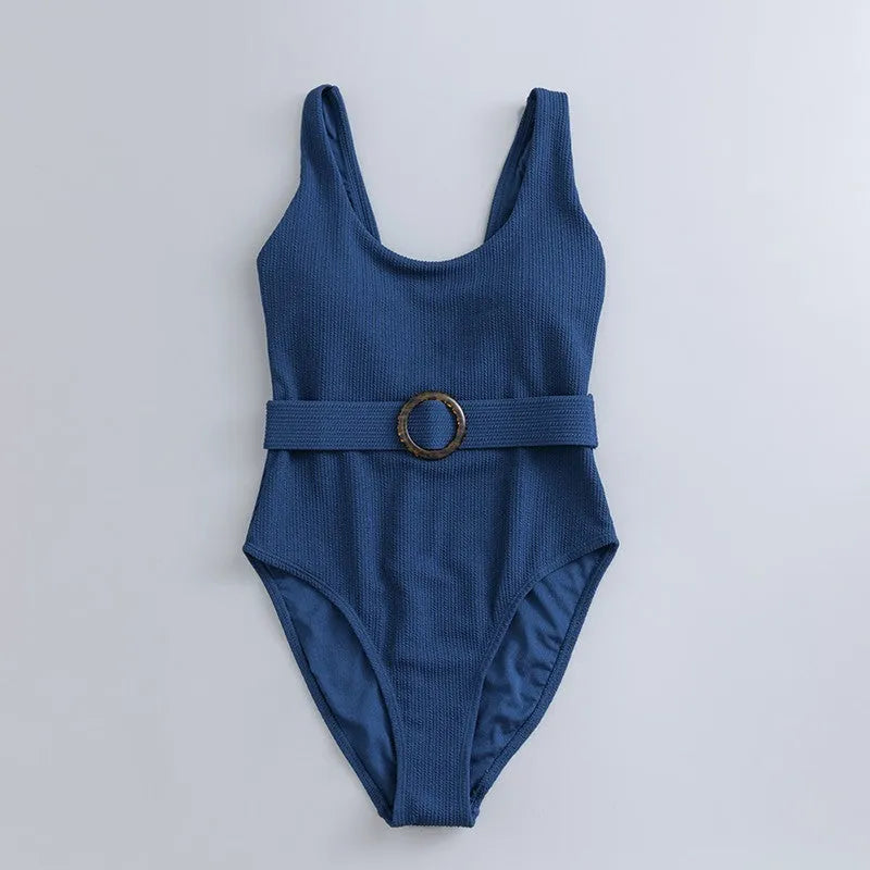 Navy blue women's one-piece swimsuit with slimming triangle silhouette and chest pads for swimming