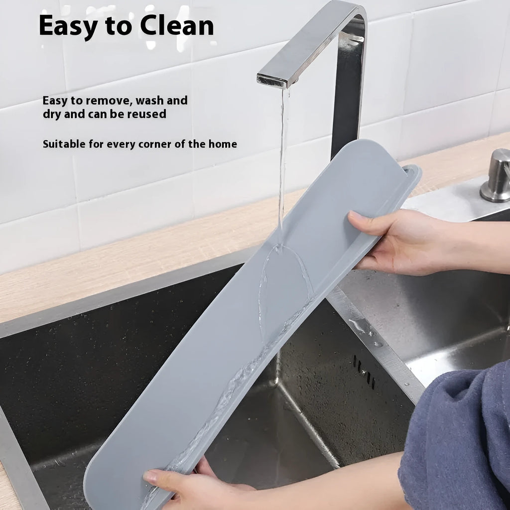 Grey silicone kitchen sink water blocking plate measuring 52mm wide x 85mm high