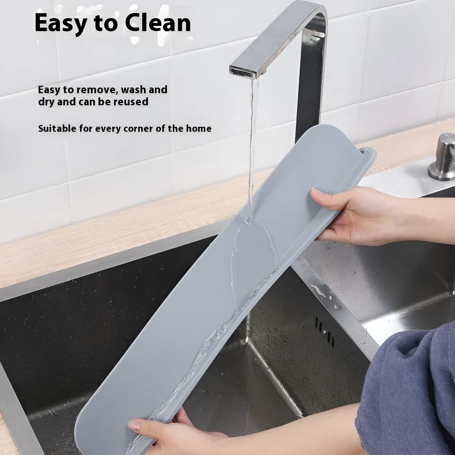 Grey silicone kitchen sink water blocking plate measuring 52mm wide x 85mm high