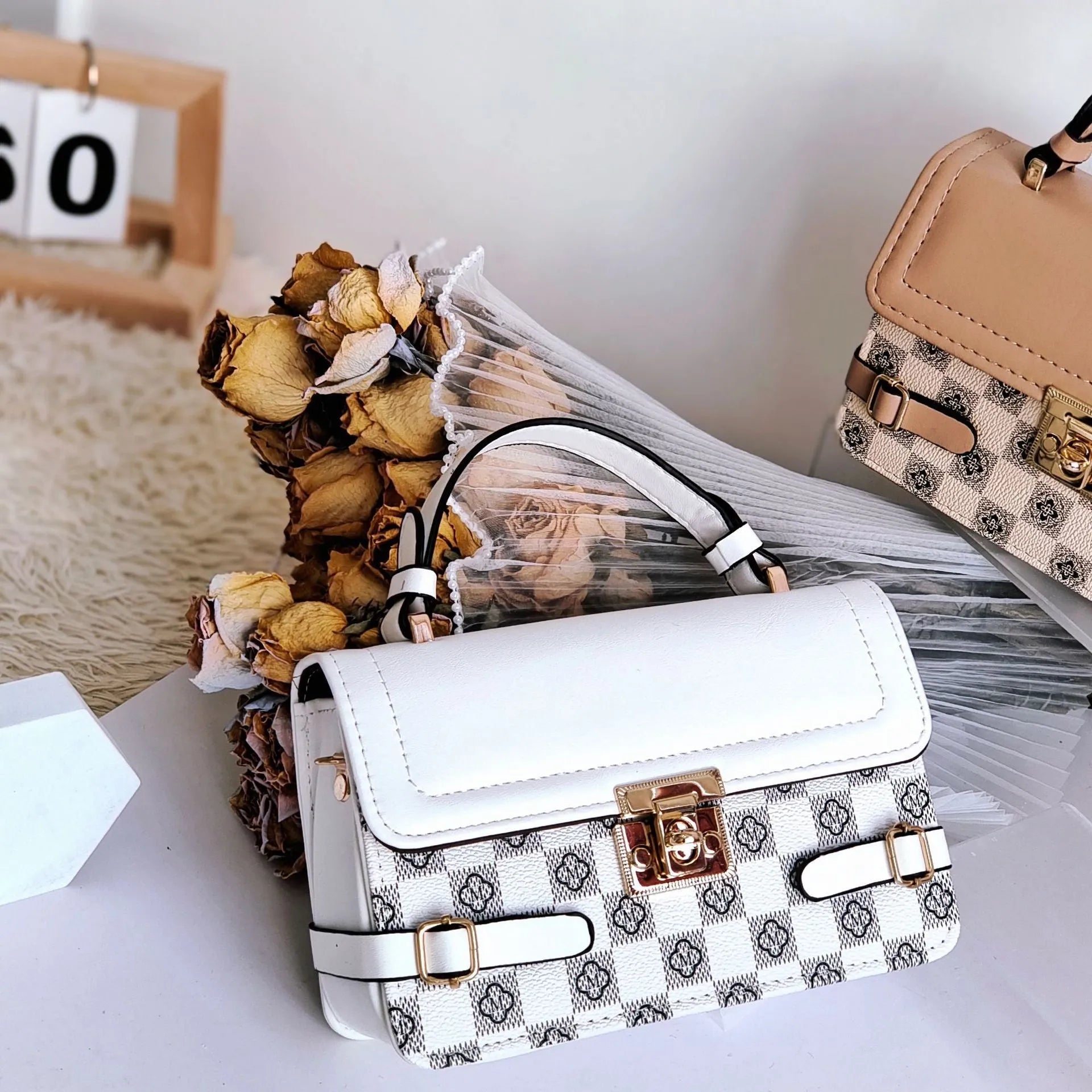 Retro-style square crossbody bag with floral stitching and a diamond pattern in PU leather.
