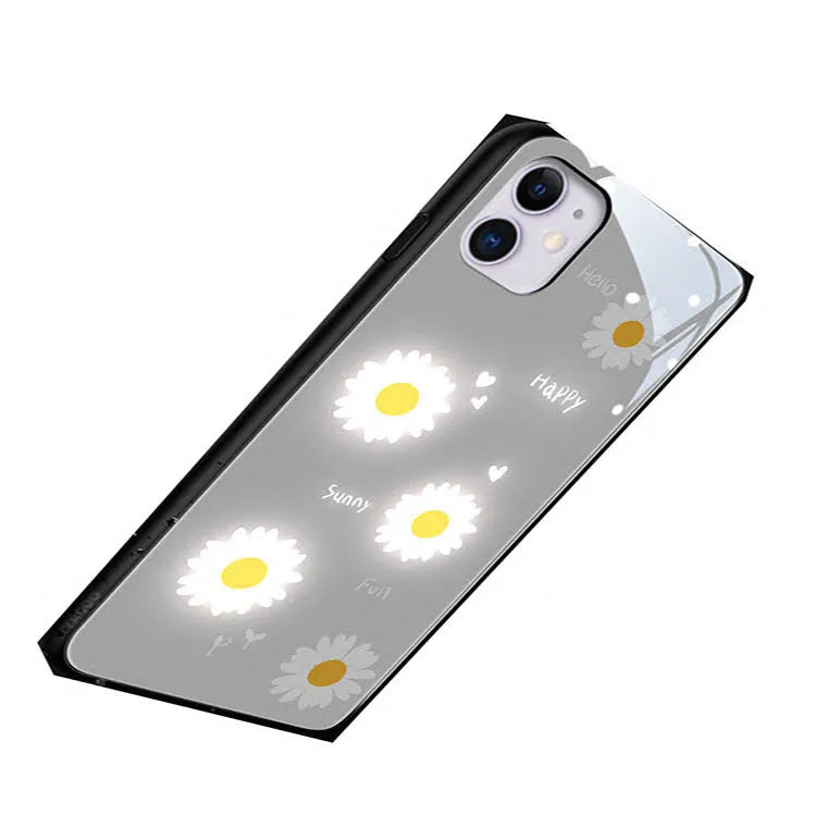 Luminous iPhone case with printed daisy design and voice-activated colour lights on TPU protective shell