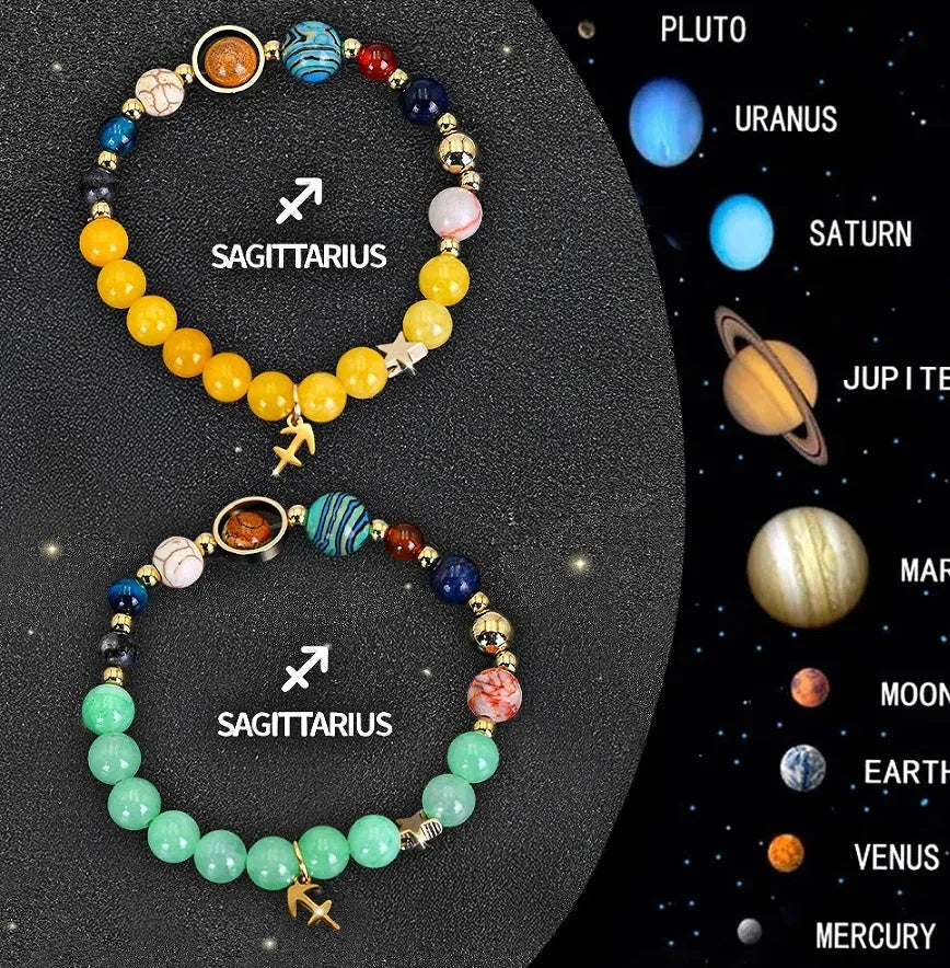 Two natural stone beaded bracelets for zodiac signs on a neutral background.