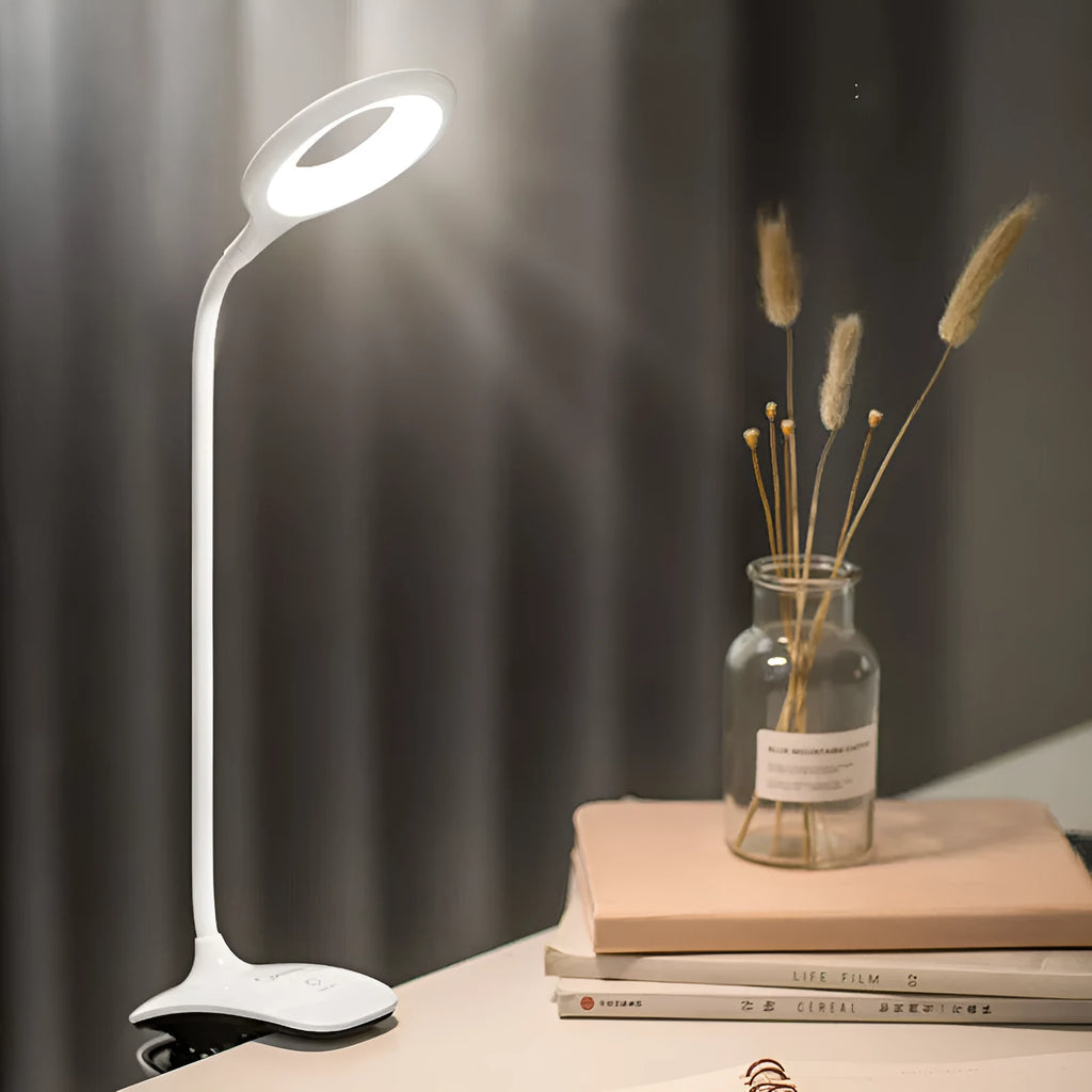 Green USB rechargeable touch table lamp with LED light source on a wooden desk.